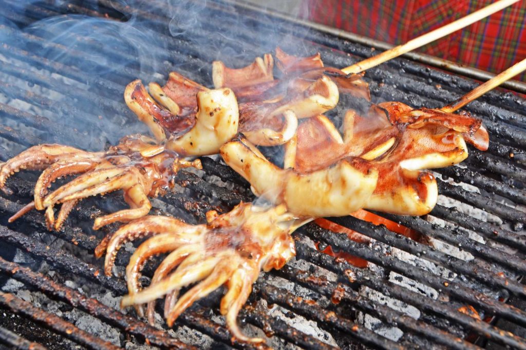 grilled squid - eating in cua can beach